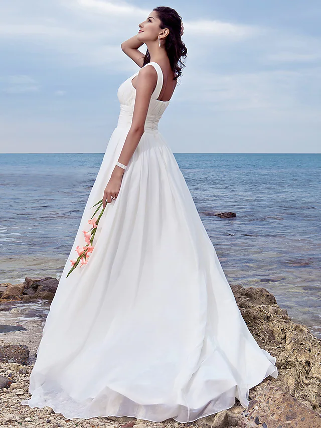 Detail of ruched draping on A-Line chiffon wedding dress.