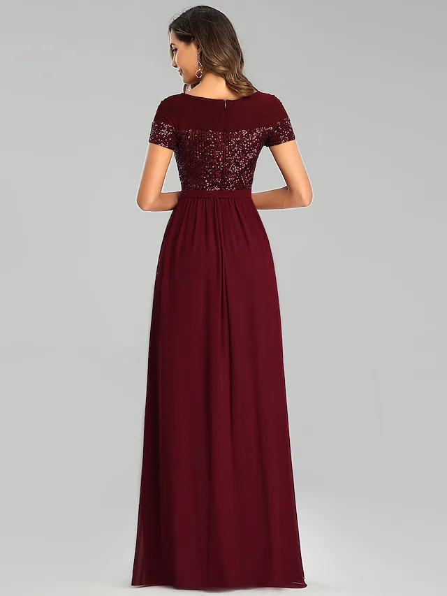 Back view of A-Line chiffon bridesmaid dress with flowing skirt.