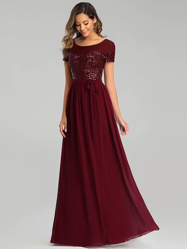 Close-up of sequin and sash details on A-Line bridesmaid dress.