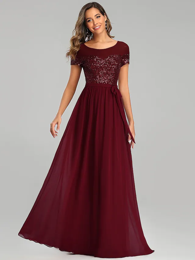 Model wearing a floor-length A-Line chiffon bridesmaid dress.