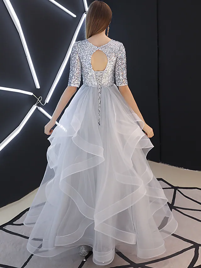 Back view of the A-Line floor-length tulle bridesmaid dress with sparkling sequin embellishments.