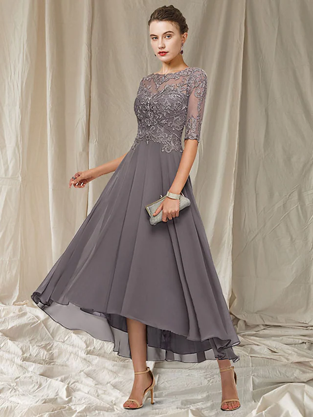 Front view of an elegant A-line Mother of the Bride dress with a jewel neck and half sleeves.