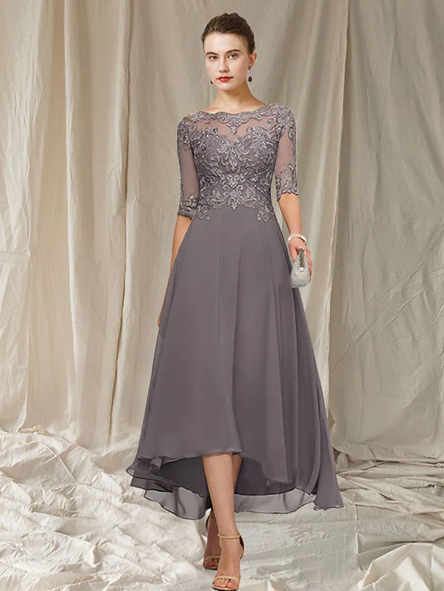 Side view of the ankle-length Mother of the Bride dress, highlighting its asymmetrical hem.