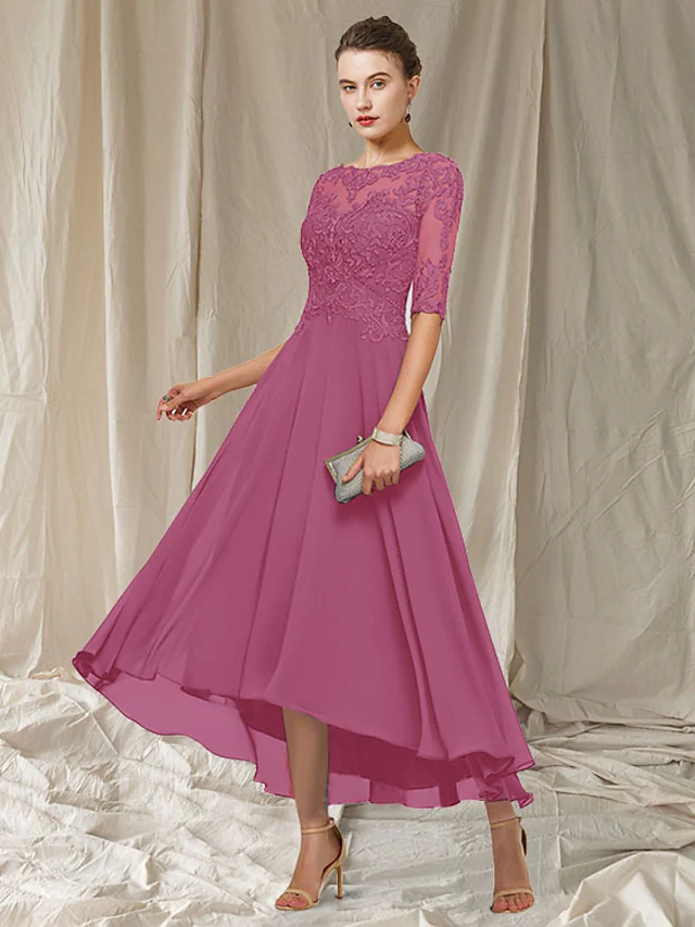 Detail of the lace appliques and pleated chiffon fabric on the formal dress.