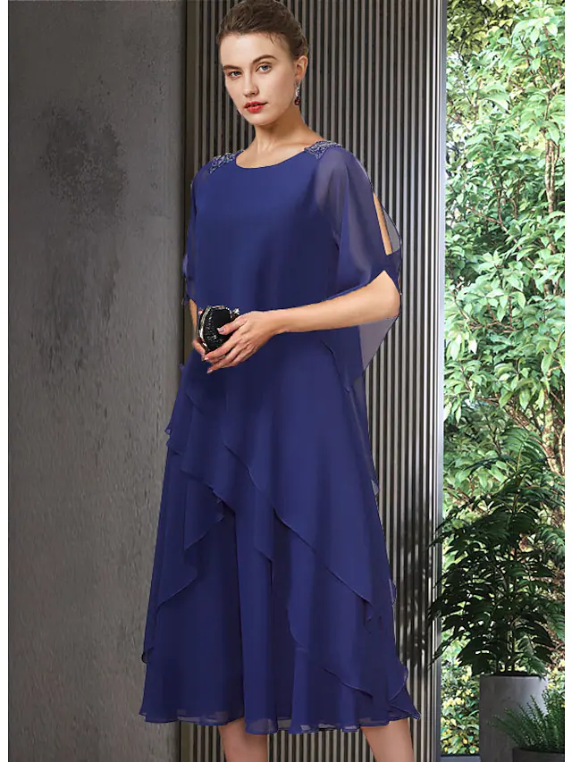 Elegant A-Line blue chiffon Mother of the Bride dress with jewel neck and half sleeves.