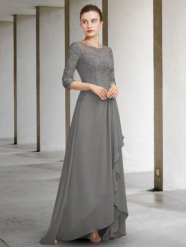 Elegant A-line mother of the bride dress with jewel neck and half sleeves.