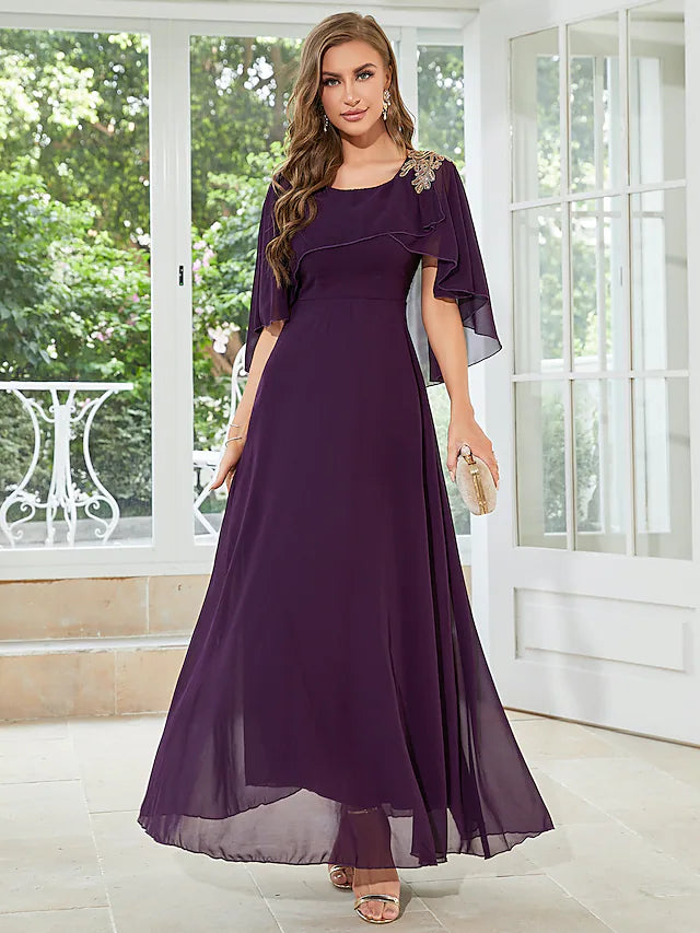 Elegant A-line chiffon gown with jewel neck and half sleeves.