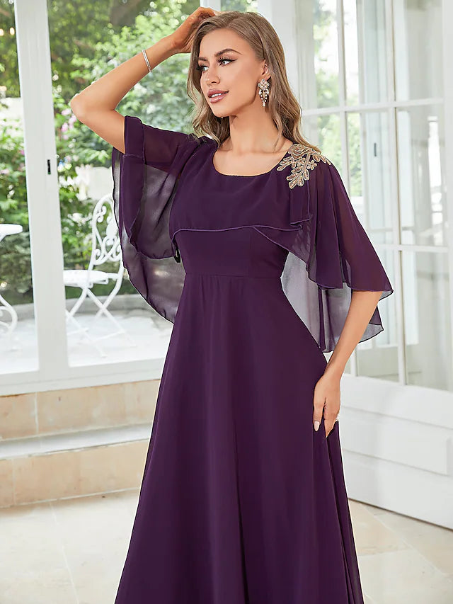 Close-up of the ruffled detail on the chiffon gown.
