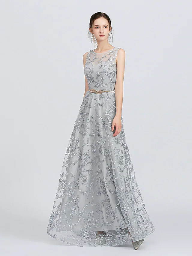 A-line lace bridesmaid dress showing back details and appliques.