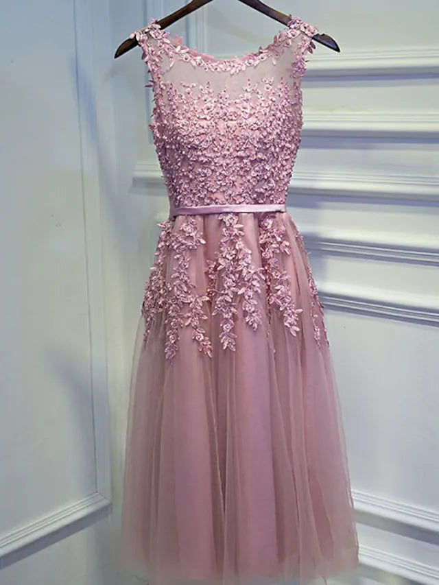 A-Line short evening dress with jewel neck and lace beading.