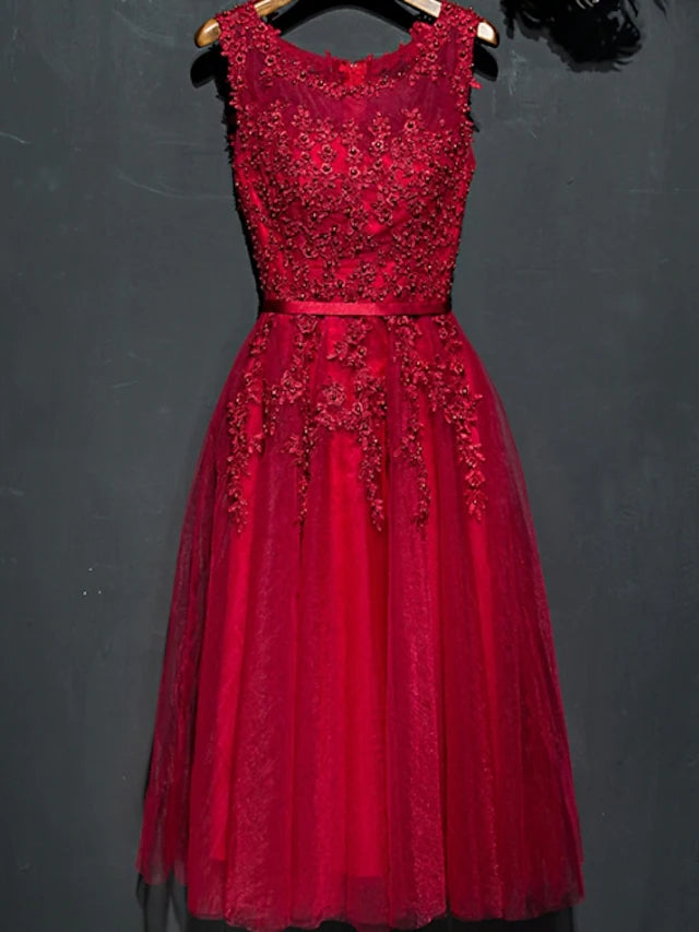 Close-up of the jewel neck and beaded lace on an A-Line dress.