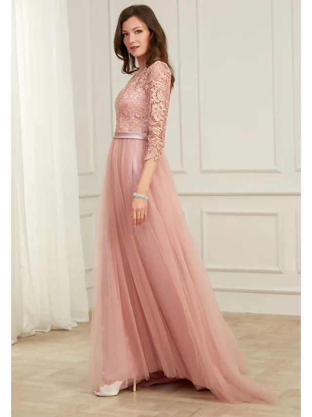 Back view of an A-line evening gown showing sweep train detail.