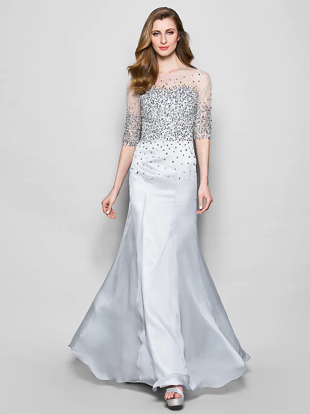 Elegant A-Line Mother of the Bride dress with jewel neck and half sleeves.