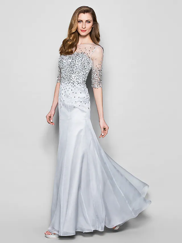 Back view of the A-Line organza gown featuring beading and sequins.