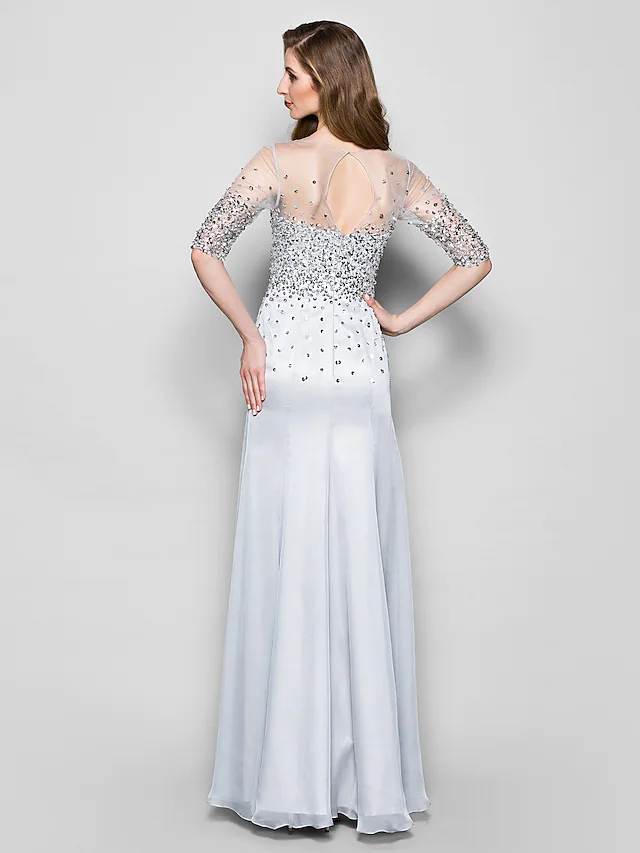 Side profile of the floor-length Mother of the Bride dress.