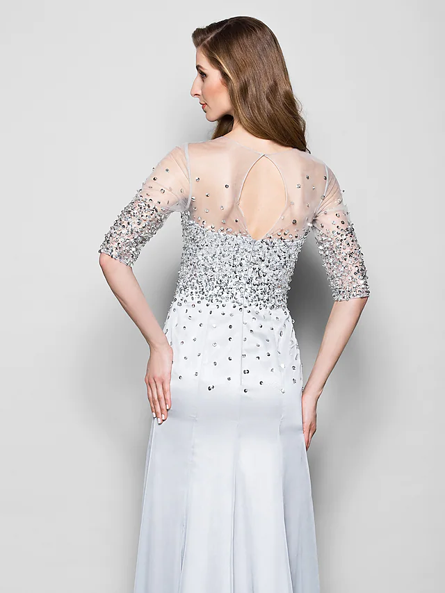 Detail of the intricate beading and sequin embellishments on the gown.