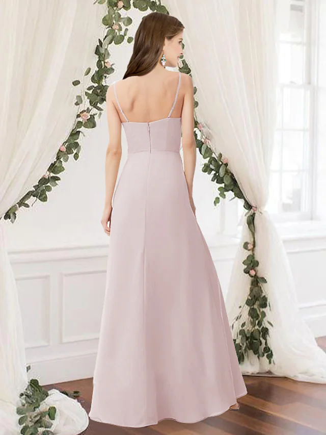Full view of a pink A-line chiffon bridesmaid dress with pleats.