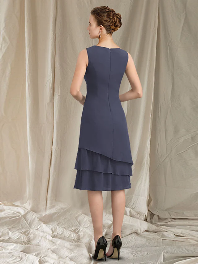 Close-up detail of the ruched ruffles and delicate chiffon fabric on the formal dress.