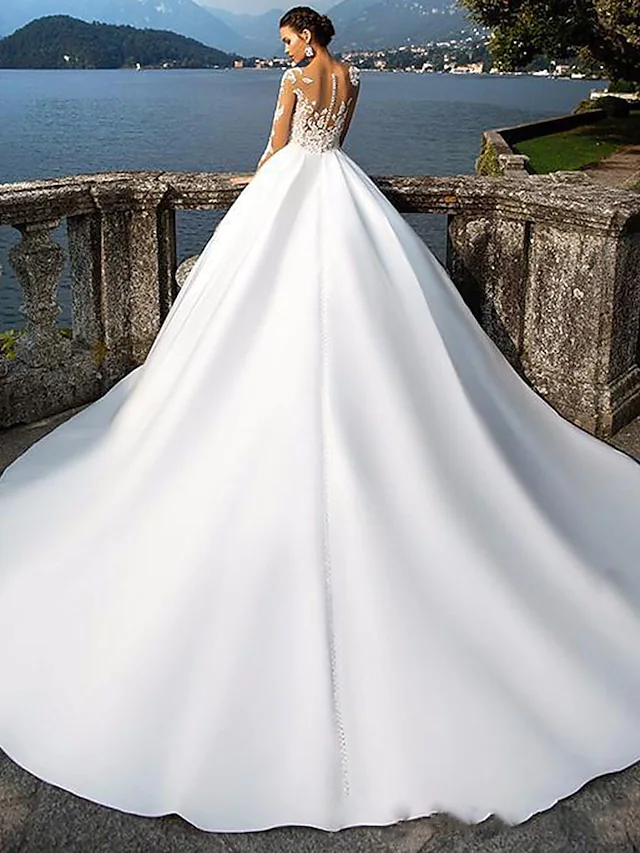 Back view of the A-Line wedding dress showing court train and appliques.