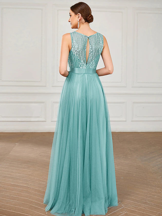 Side view of the sleeveless A-line floor length dress.