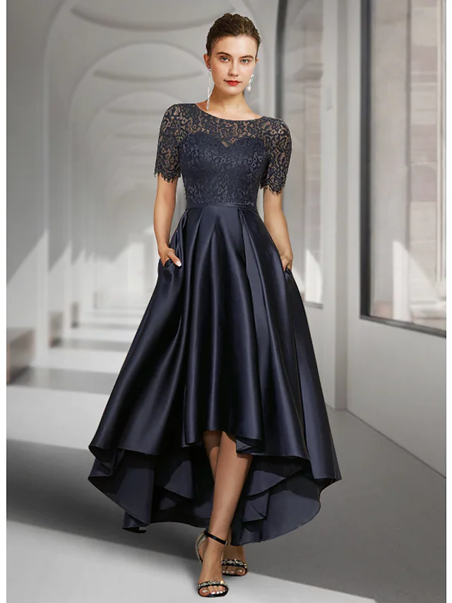 Elegant A-line mother of the bride dress with jewel neck, short sleeves, lace, and satin pleats, front view.