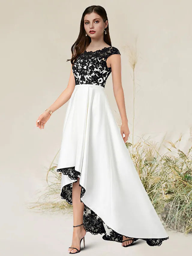 Sleeveless asymmetrical satin dress, side view.