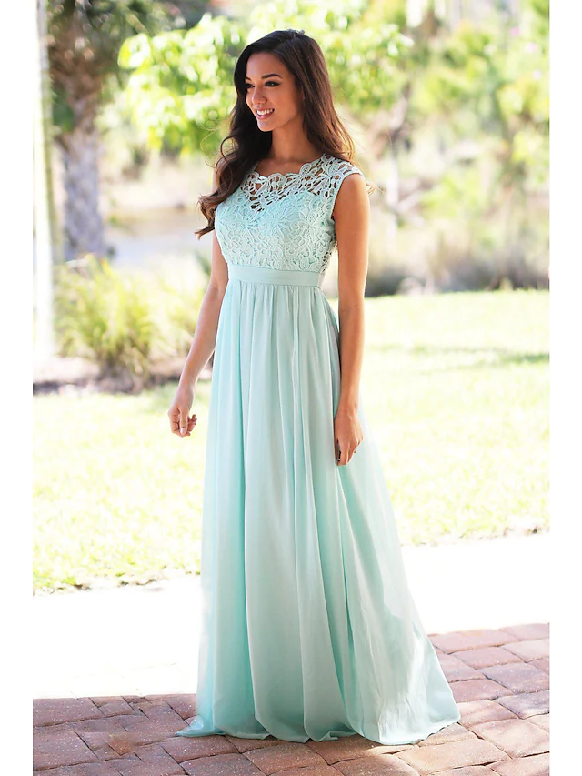 A-Line chiffon and lace bridesmaid dress with jewel neck, sash, and pleats.