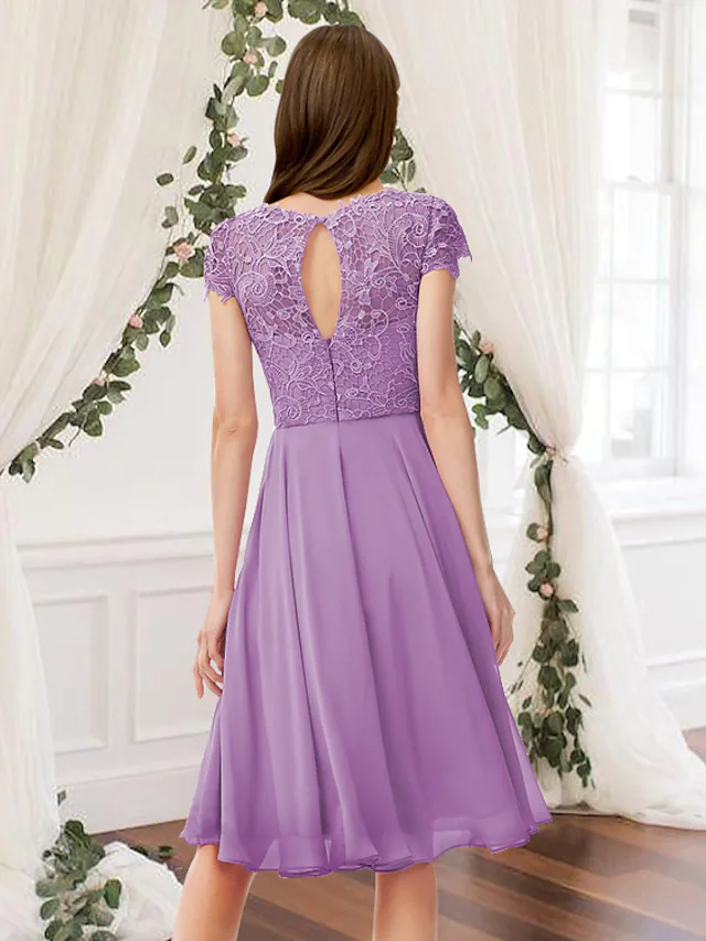 Knee-length A-Line bridesmaid dress in chiffon and lace.