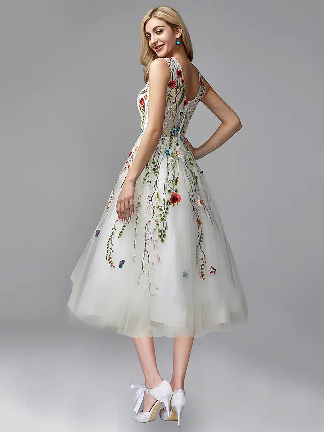 Back view of an A-line chiffon dress featuring lace details.