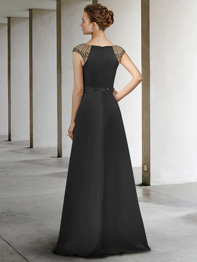 Side view of a floor-length satin A-line dress for mother of the bride.