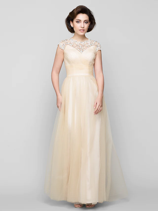 Back view of the sleeveless Mother of the Bride dress with sheer tulle.