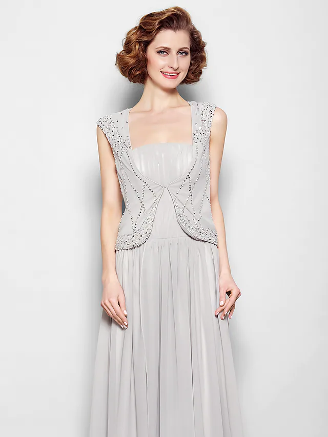 Model showcasing the full silhouette of the A-line formal gown.