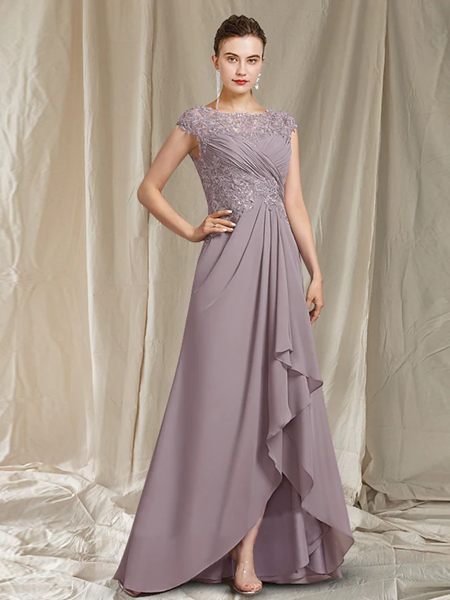 Elegant A-line mother of the bride dress with jewel neck and short sleeves, featuring lace and sequin details.