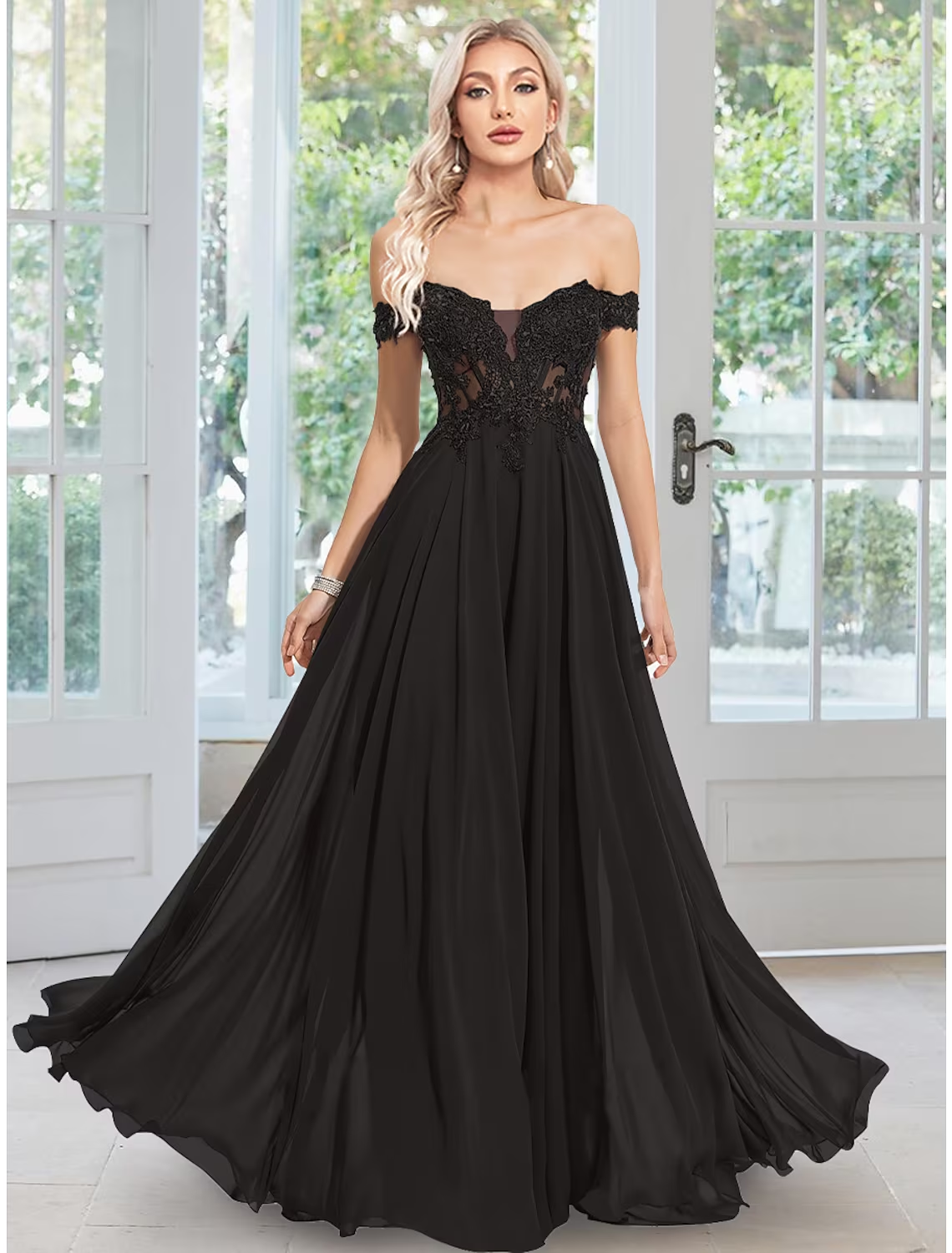 Elegant A-Line off-shoulder chiffon evening gown with floral appliques.