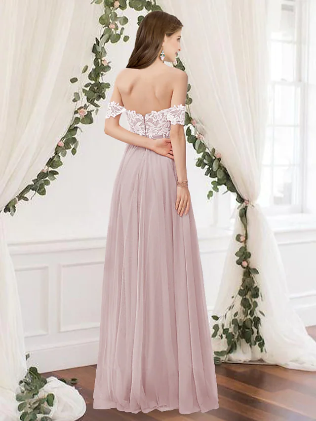 Floor-length A-Line bridesmaid gown featuring pleats and appliques, side view.