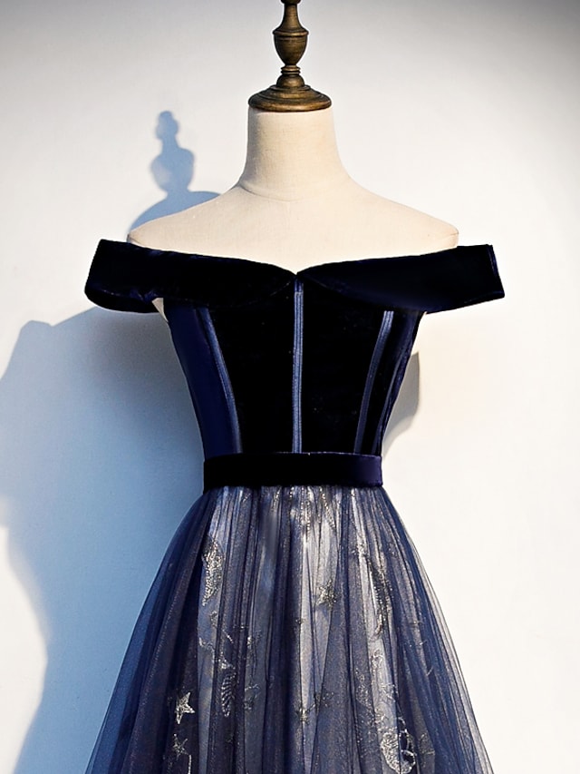 Back view of A-line floral off-shoulder tulle dress with sweep train.