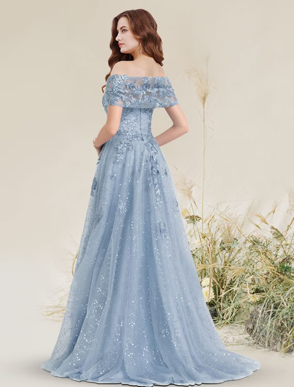 Back view of A-Line off-shoulder dress showing sweep train.
