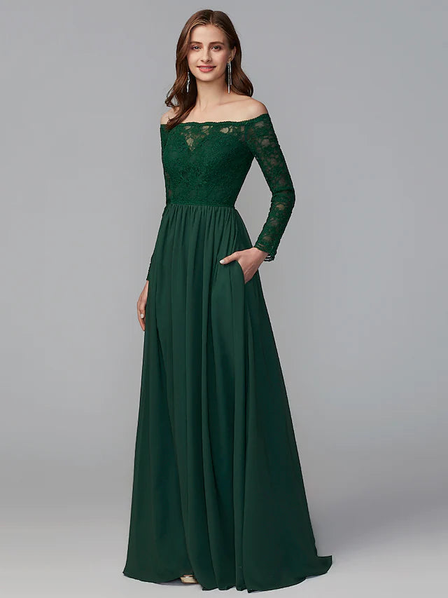 Back view of the floor-length chiffon and lace bridesmaid gown.