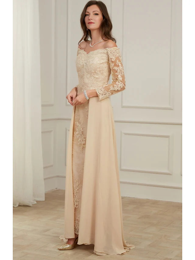 Detail of the off-shoulder neckline and long sleeves on the evening gown.