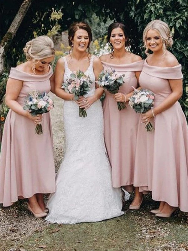 Elegant A-Line off-shoulder ruffled asymmetrical bridesmaid dress in stretch crepe.