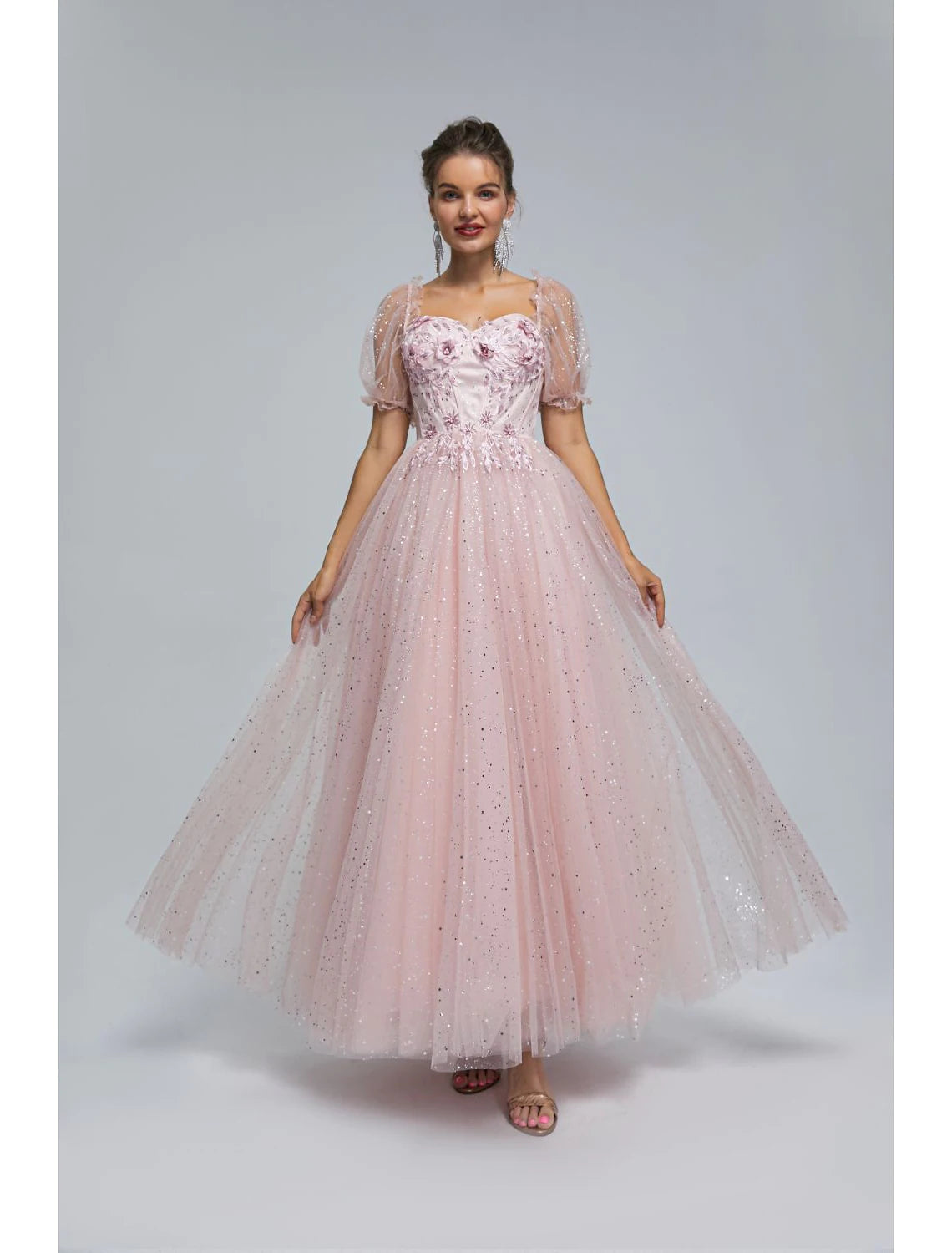Full length view of the A-line tulle dress with short sleeves.