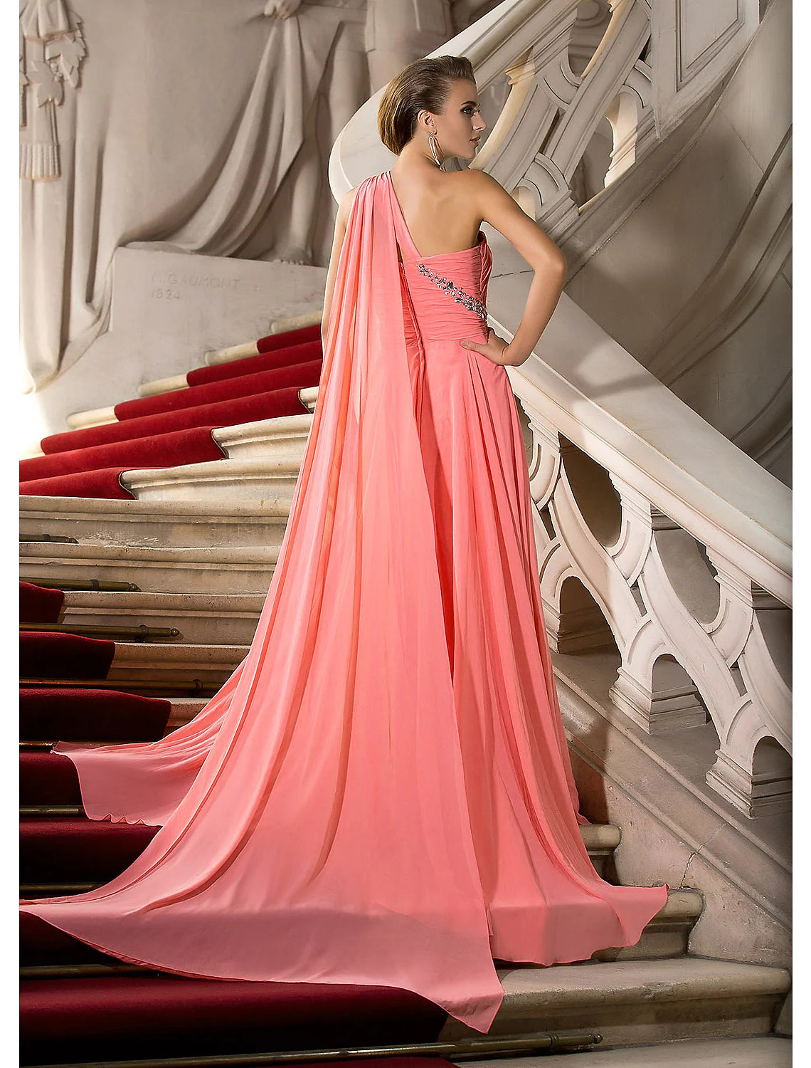Back view of the A-line chiffon dress showcasing the draping.