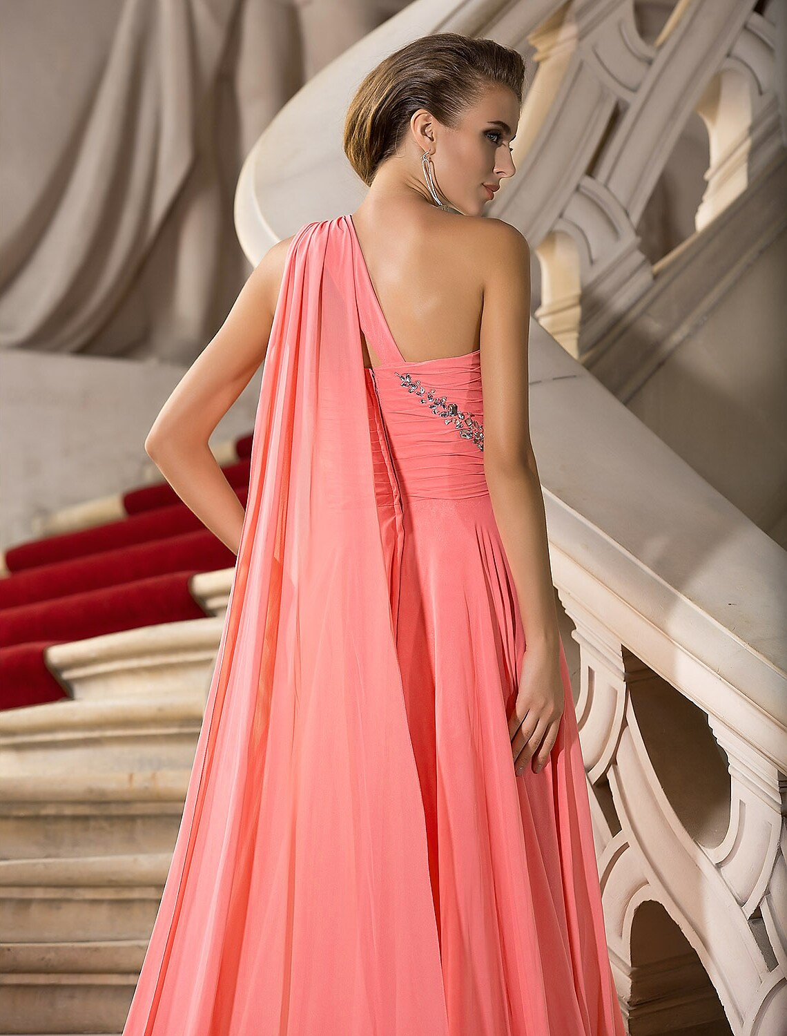 Close-up of the crystal details on the one-shoulder strap.