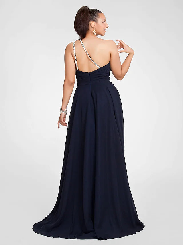 Close-up of the ruched beading and cut-out detail on the chiffon dress bodice.