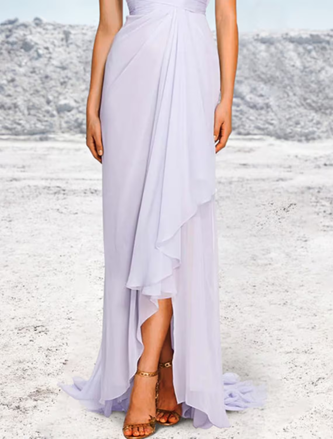 Close-up of the floral pattern and ruched chiffon fabric on the evening gown.