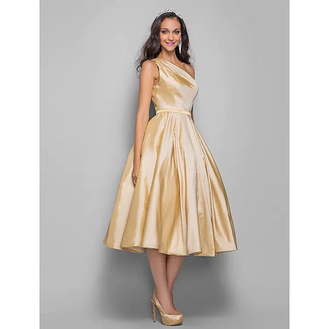 Close-up of the one-shoulder neckline and taffeta fabric.