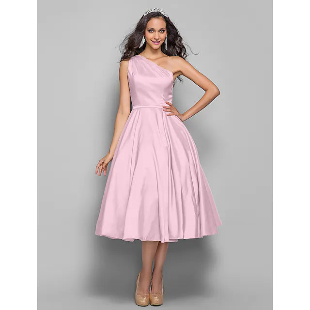 Model wearing the A-line one-shoulder dress for a party.