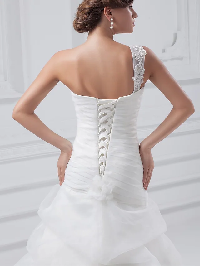 Full view of A-Line bridal gown with spaghetti strap and one-shoulder design.