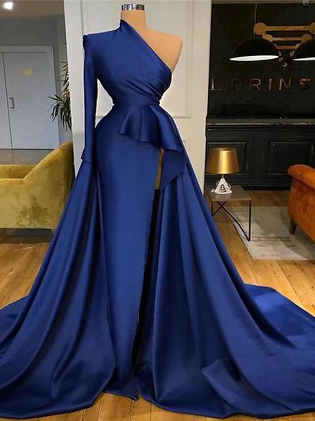 Elegant A-line peplum one-shoulder long sleeve satin formal gown with ruffles and a slit.