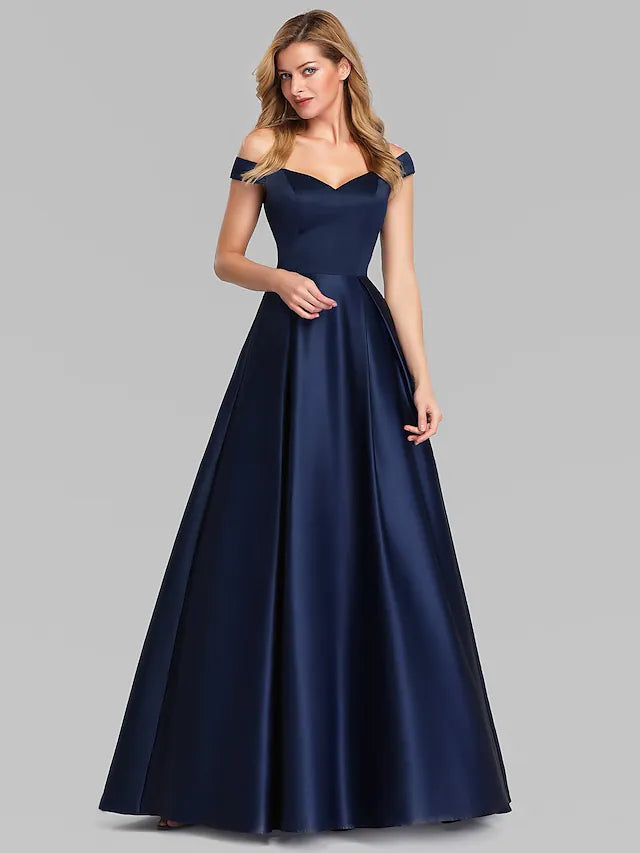 Side view of a sleeveless A-line gown with ruched bodice.